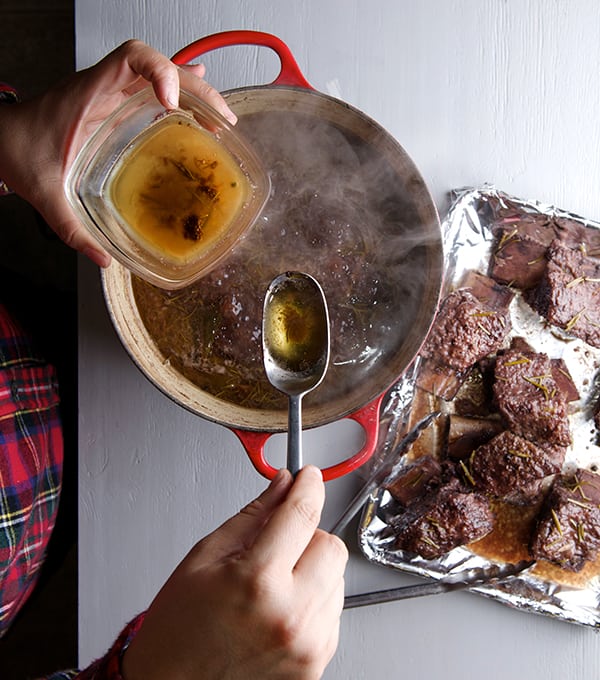 Pomegranate-Tempranillo-Braised-Short-Ribs_Degrease-and-strain-the-juices-to-create-the-pomegranate-sauce